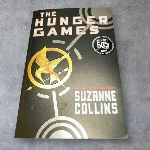 Other - New: THE HUNGER GAMES Book 1- Suzanne Collins, Paperback LIKE NEW!